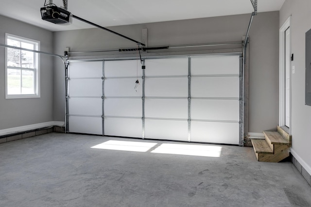 garage featuring a garage door opener