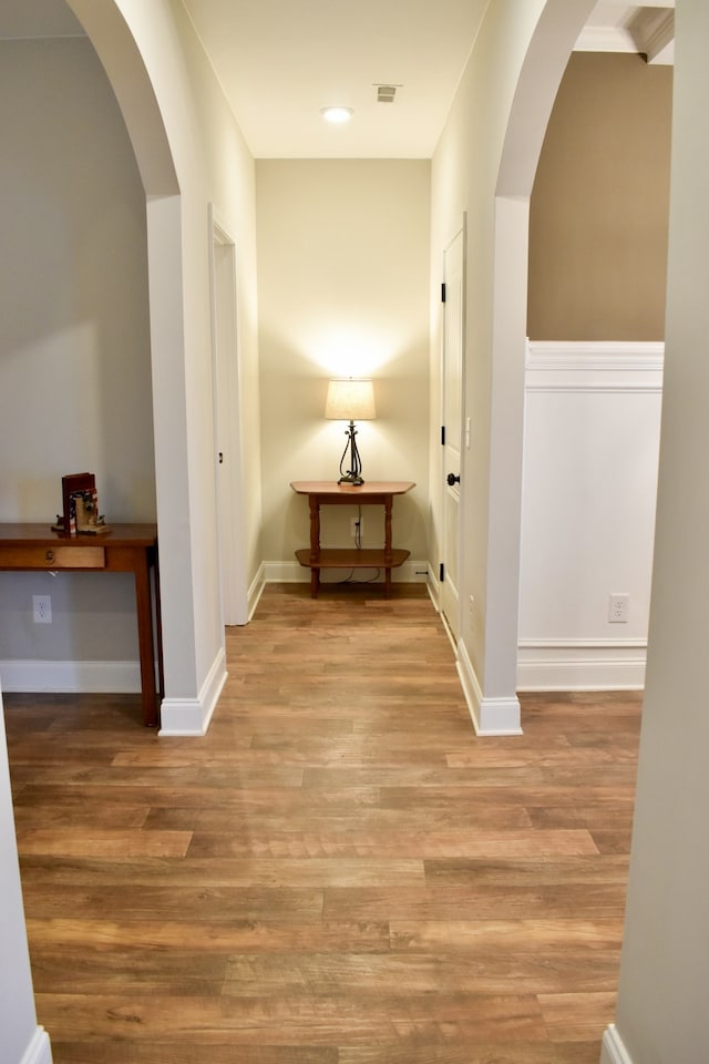 hall with light hardwood / wood-style flooring