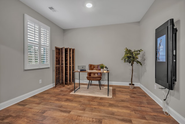 living area featuring hardwood / wood-style flooring