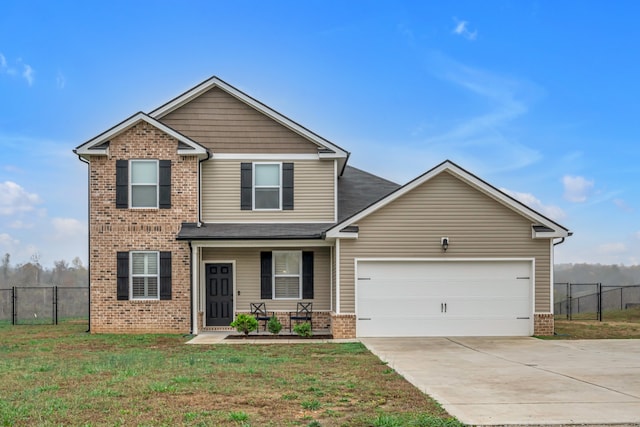 craftsman-style home with a garage and a front lawn