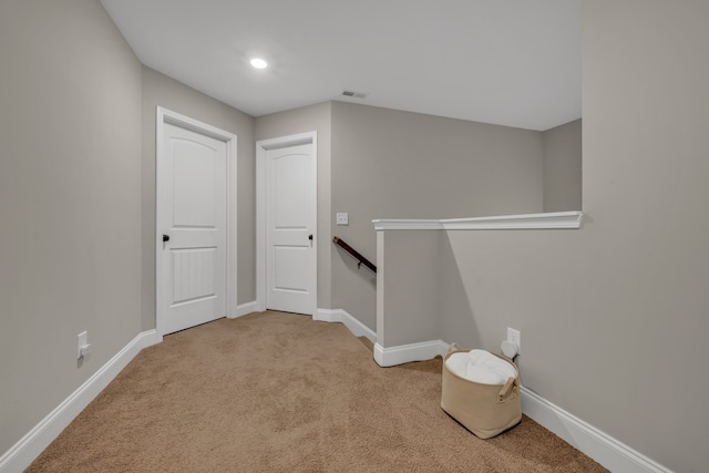 interior space with light colored carpet