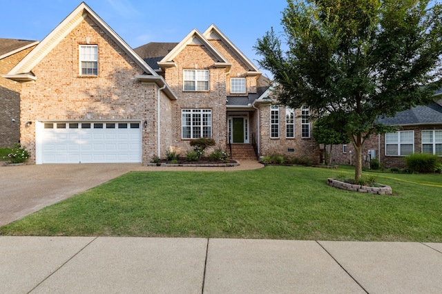 view of front of property featuring a garage and a front lawn