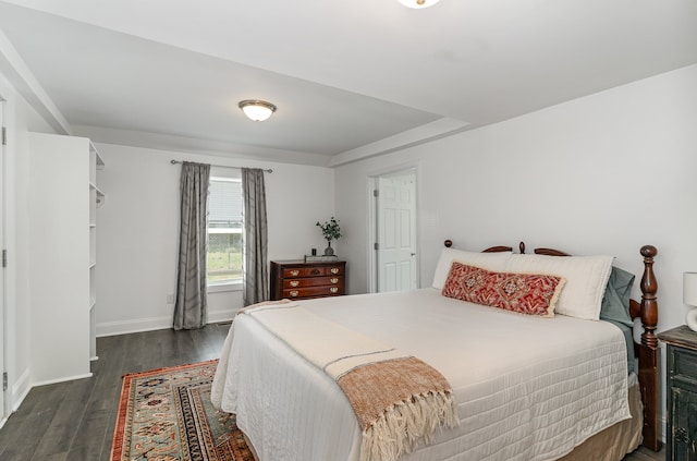 bedroom featuring dark hardwood / wood-style floors