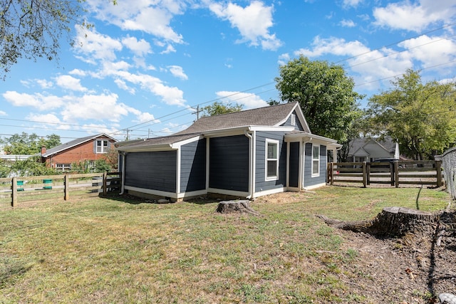 view of home's exterior featuring a lawn