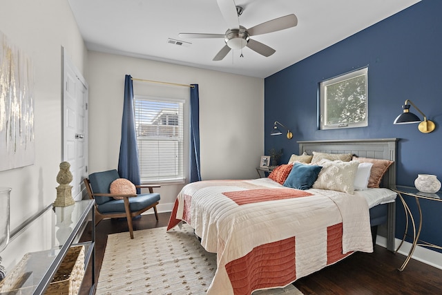 bedroom featuring wood-type flooring and ceiling fan