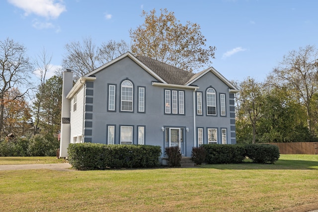 view of front of home with a front yard