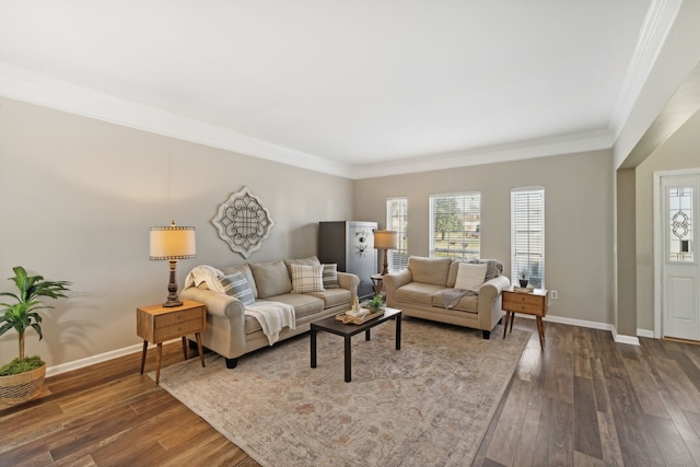 living room featuring dark hardwood / wood-style floors and ornamental molding