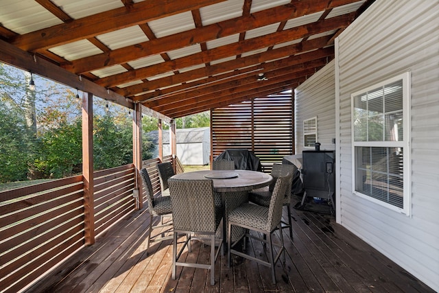 wooden terrace featuring a grill