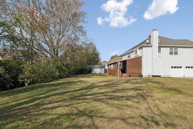 view of yard with a garage