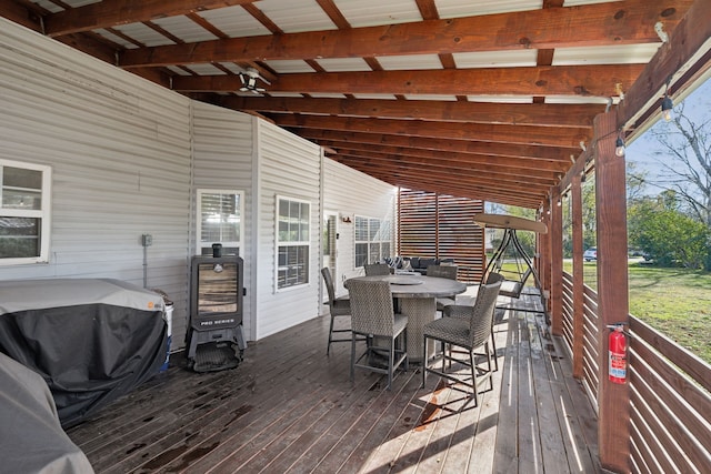 wooden terrace featuring a grill