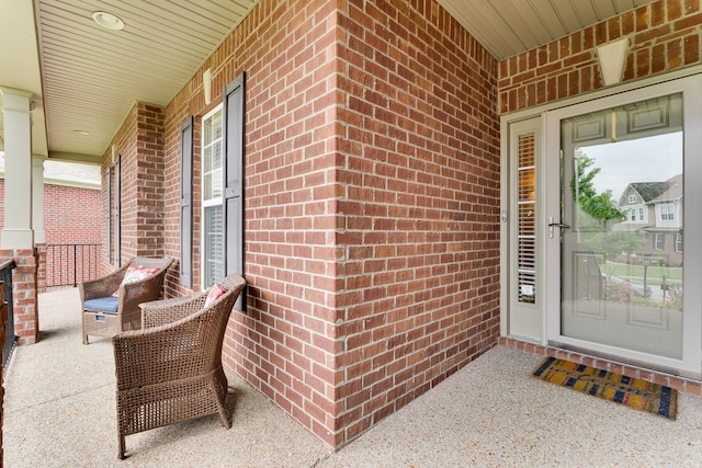 doorway to property with covered porch