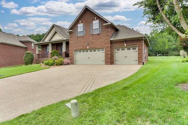 view of front of house featuring a garage and a front yard