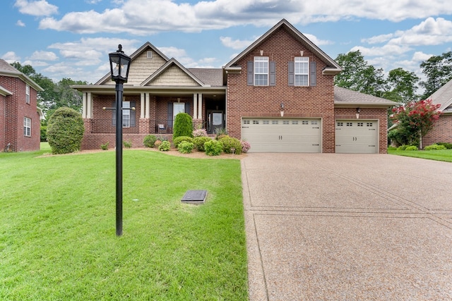 craftsman house featuring a garage and a front yard