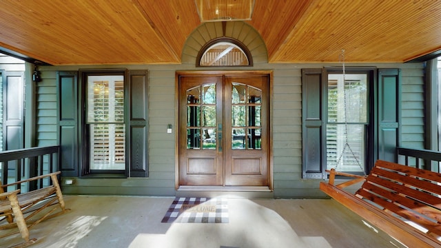 doorway to property featuring a porch