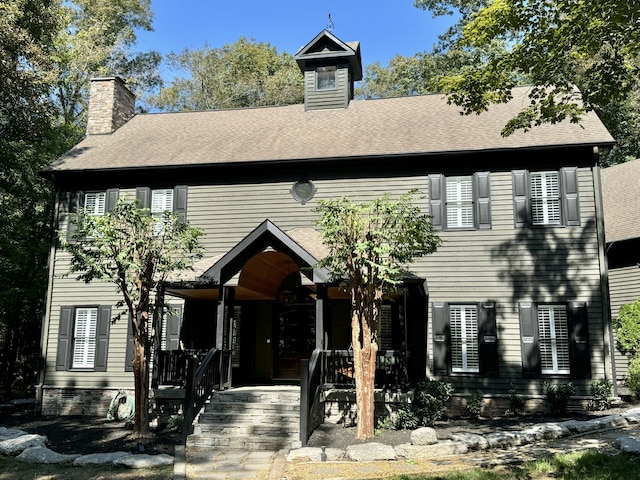 view of front of property featuring covered porch