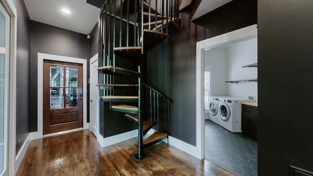 interior space featuring washer and clothes dryer and wood-type flooring