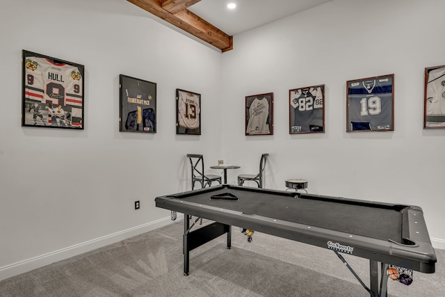 rec room featuring carpet flooring and beam ceiling