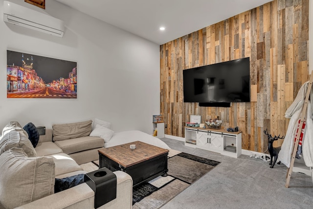 carpeted living room with a wall unit AC and wooden walls