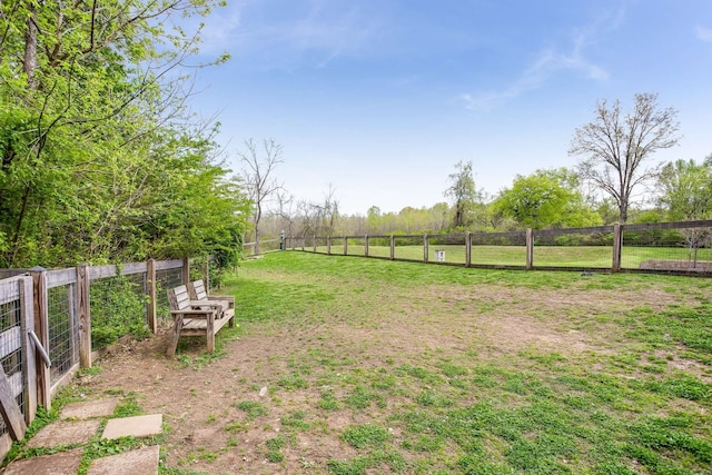 view of yard featuring a rural view