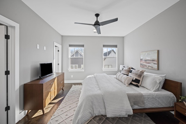 bedroom featuring wood-type flooring and ceiling fan