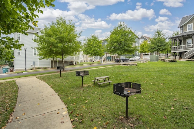 view of community with a yard