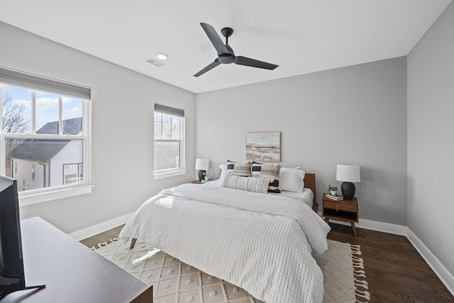 bedroom featuring ceiling fan and hardwood / wood-style floors