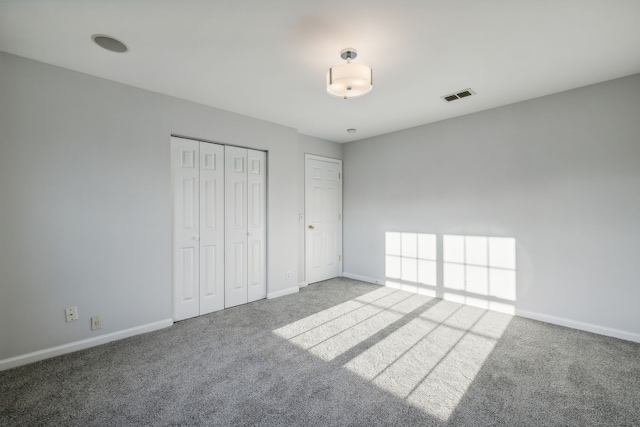 unfurnished bedroom featuring carpet floors