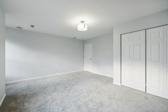 unfurnished bedroom featuring carpet floors