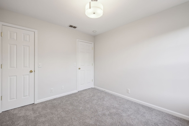 unfurnished bedroom featuring carpet flooring