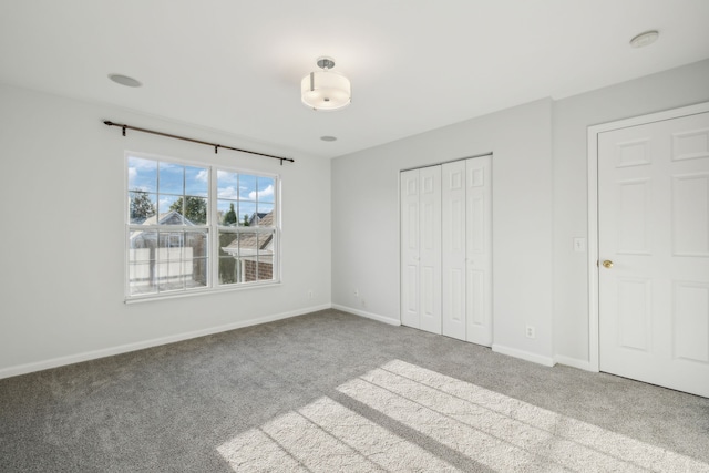 unfurnished bedroom with carpet