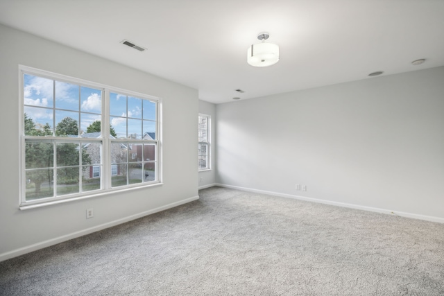 view of carpeted spare room