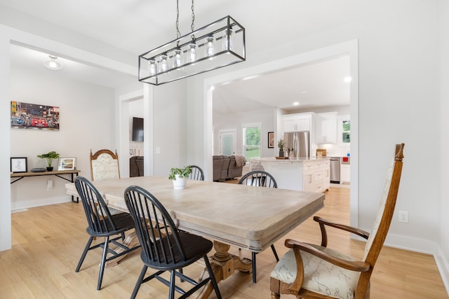 dining room featuring light wood-type flooring