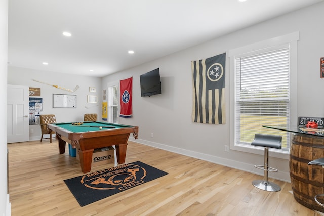 rec room featuring light wood-type flooring and a wealth of natural light