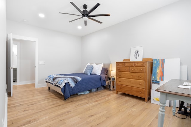 bedroom featuring light hardwood / wood-style floors and ceiling fan