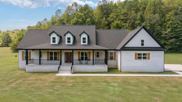 view of front of house with a front lawn and covered porch