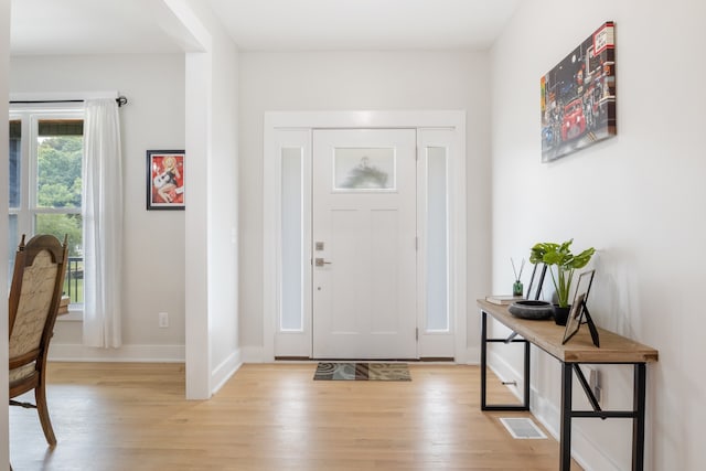 entrance foyer featuring light hardwood / wood-style floors