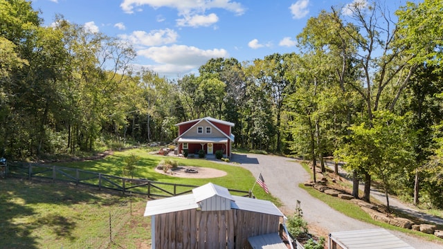 surrounding community featuring a lawn