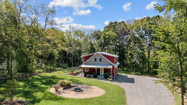 view of front of home featuring a porch and a front yard