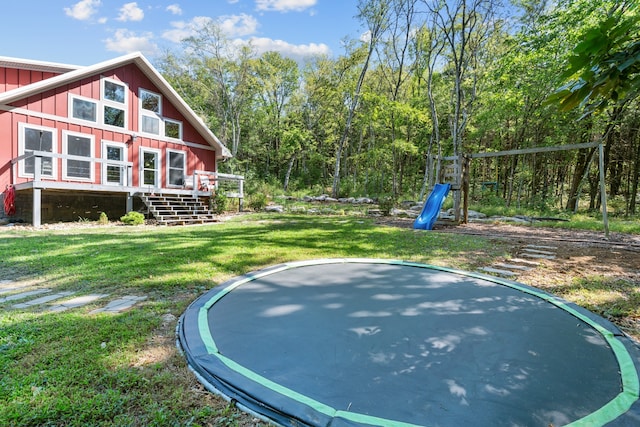 view of yard with a trampoline