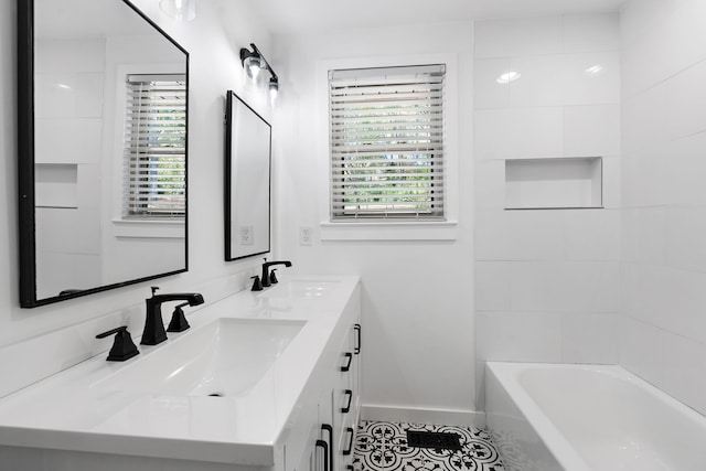 bathroom with shower / bathing tub combination, vanity, and tile patterned floors