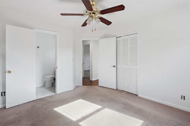 unfurnished bedroom featuring connected bathroom, a closet, light carpet, and ceiling fan