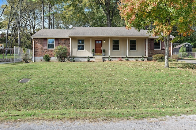 ranch-style house featuring a front lawn