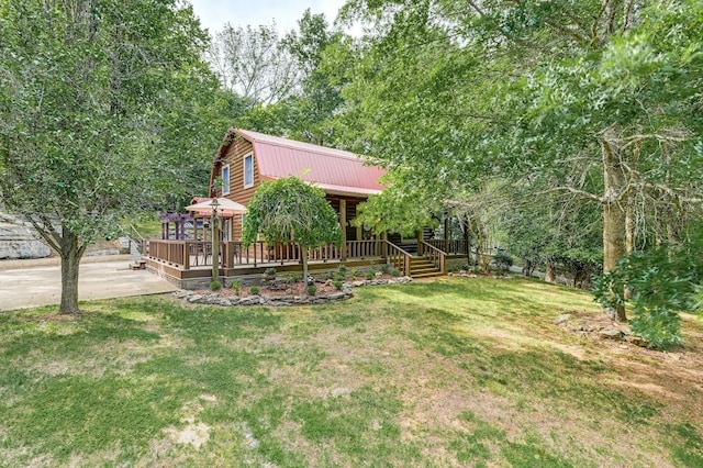 view of yard featuring a wooden deck