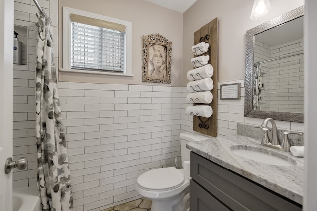 full bathroom with tile walls, vanity, shower / bath combination with curtain, and toilet