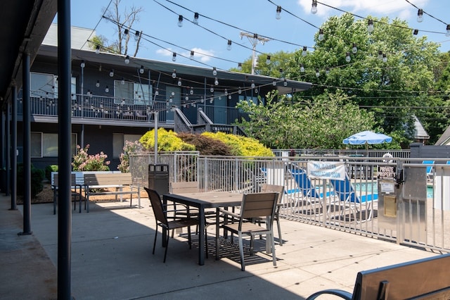 view of patio with a community pool