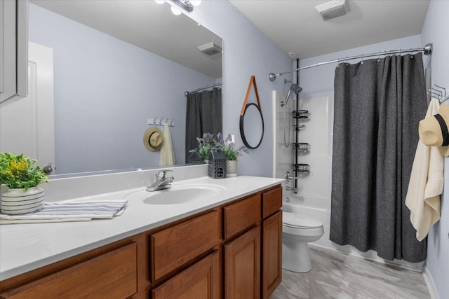 full bathroom with vanity, toilet, and shower / tub combo with curtain