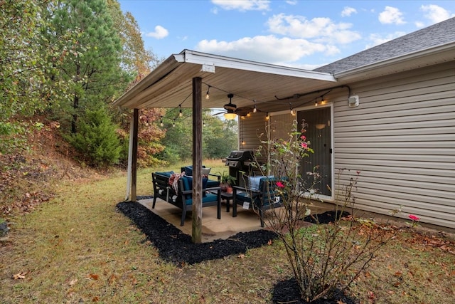 view of yard with ceiling fan and a patio area