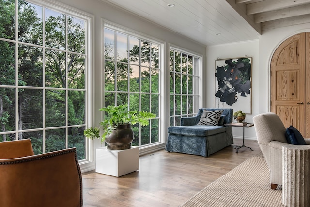 sunroom / solarium featuring plenty of natural light