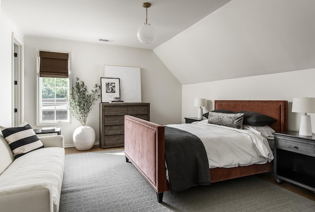 bedroom featuring vaulted ceiling