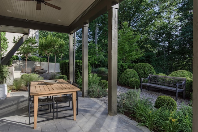 view of patio featuring ceiling fan